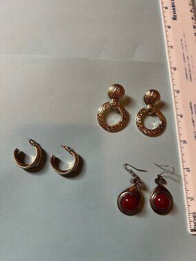 3 pairs of pierced earrings